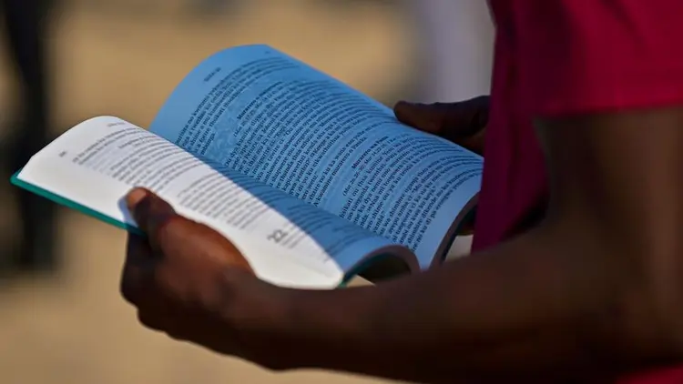 Reading the New Testament Bible in Kwamashi for the first time